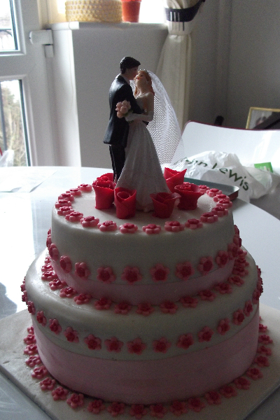 Shots of wedding cake taken by the bride and groom