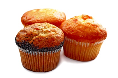 Three muffins isolated on white